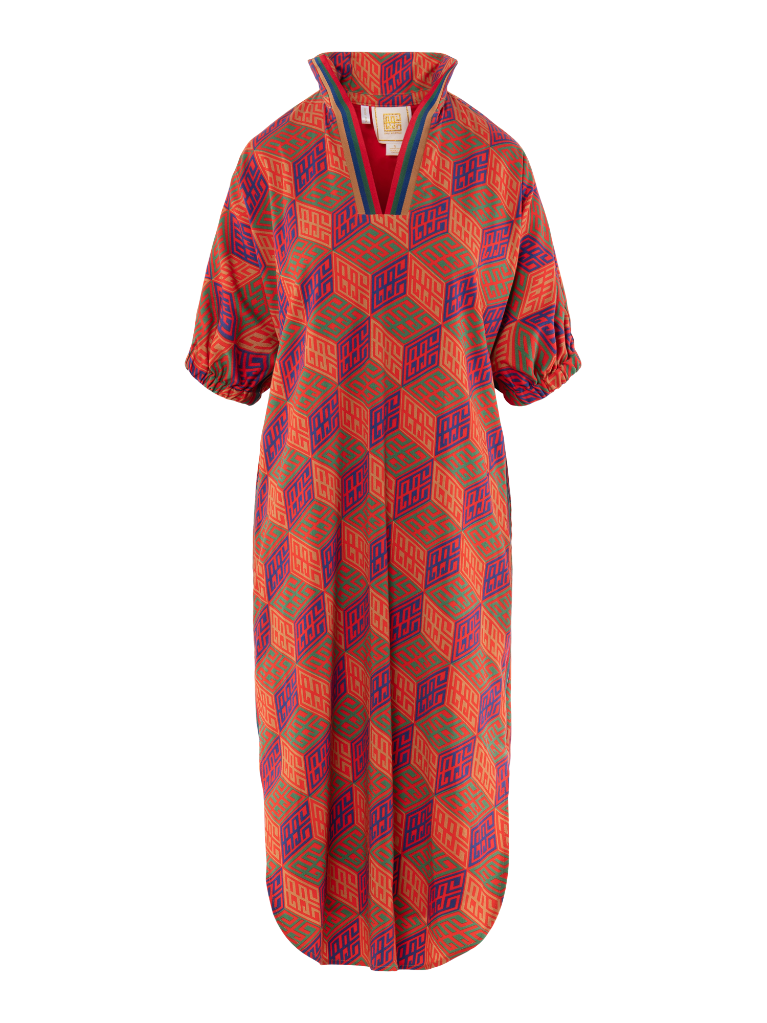 The Poppy Caftan is a loose-fitting, knee-length dress with short puffed sleeves, a geometric monogram print in red, orange, purple, and blue, a V-shaped collar, and a rounded hem.