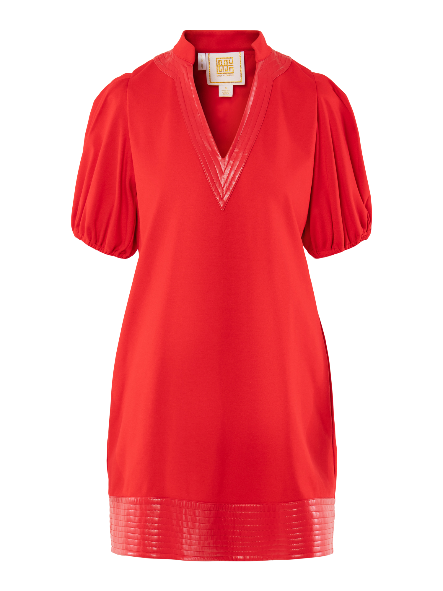 The Hampton Mini is a short red dress featuring puffed short sleeves, a V-neck with vegan leather trim, and a shiny band at the hem. Its relaxed fit and bold High Risk Red color make it a standout piece.