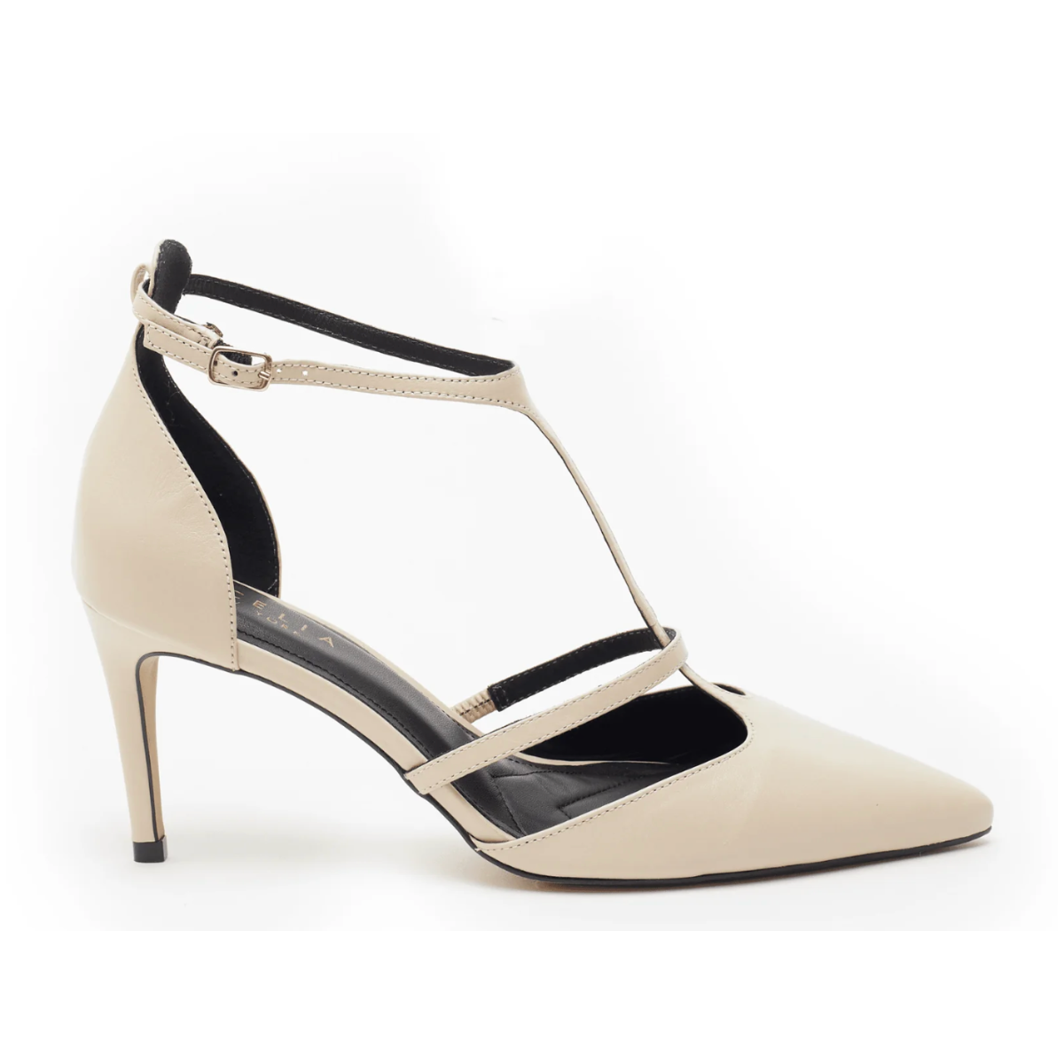 The Crawford Heel - Beige Lizzard is a stylish high-heeled shoe featuring a pointy toe and elegant slender stiletto heel. It highlights a T-strap design with an adjustable ankle strap, complemented by an additional horizontal strap across the foot.