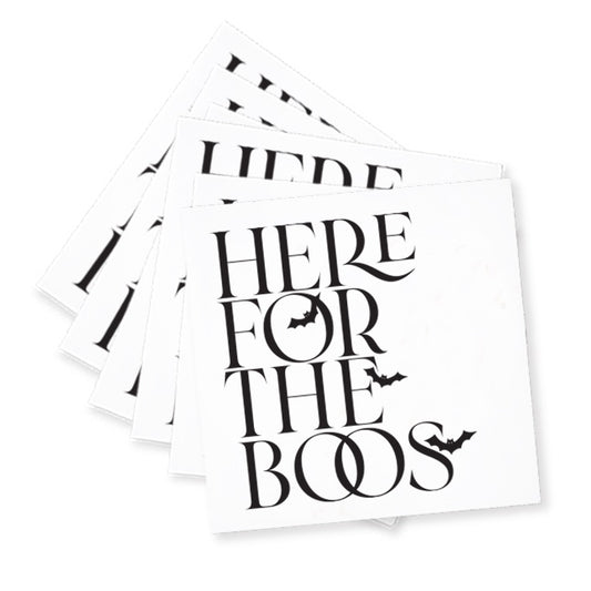 A set of 20 "Here For The Boos" cocktail napkins showcases sleek black text and bat illustrations on a white background, making them ideal for adding a festive touch to any gathering. Benefit from quick shipping to have them in time for your next celebration!