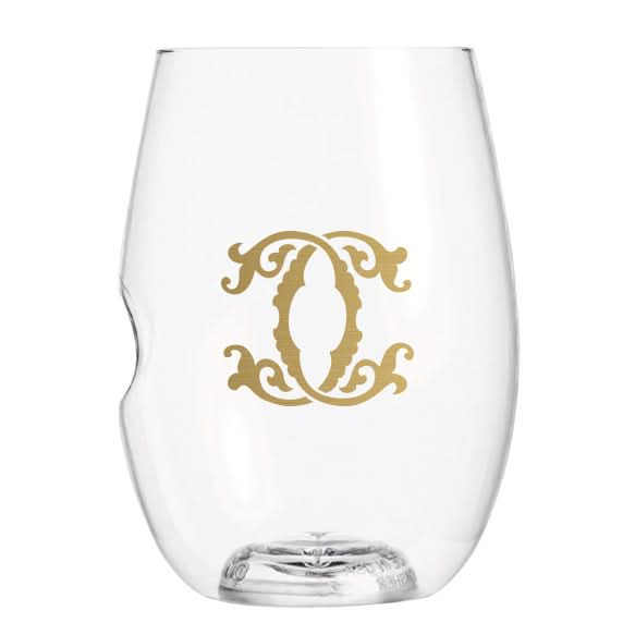 The 1-Letter govino® Stemless Shatterproof Wine glass features a clear, stemless design with an exquisite gold monogram centered on the front. It includes a thumb indentation for easy gripping, combining elegance with reusability for any occasion.