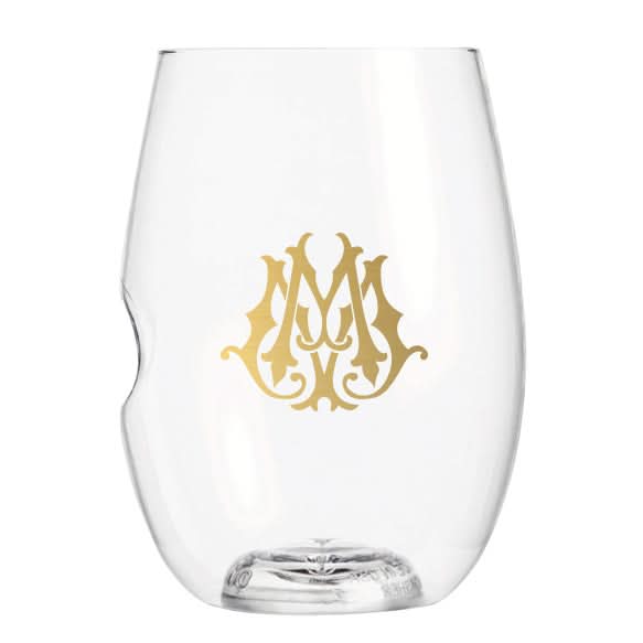 The 1-Letter govino® Stemless Shatterproof Wine glass is BPA-free, reusable, and features a clear design with an embossed thumb notch and gold monogram—perfect for any occasion.
