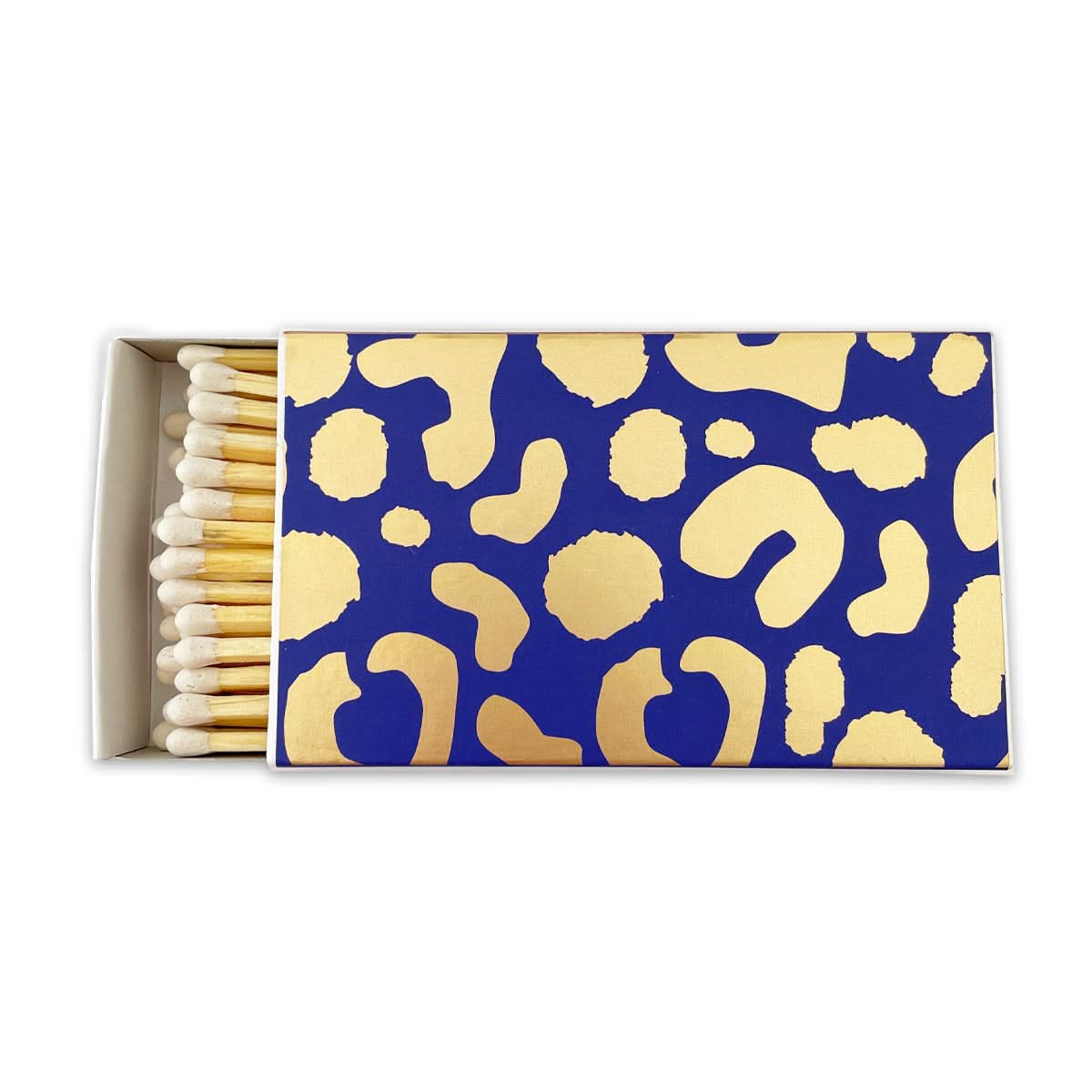 The "Choose Joy" matchbox showcases a drawer-style opening, adorned with a blue background and an abstract gold leopard print pattern. Inside, the matchsticks are neatly arranged with white tips.