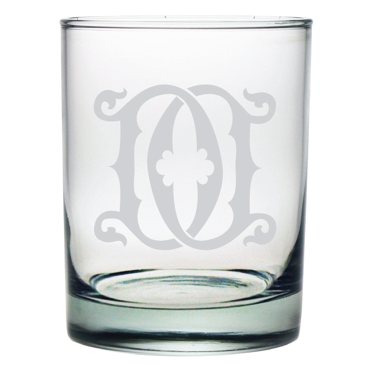 The 1-Letter Monogrammed Lowball Glass is clear and cylindrical, featuring a frosted ornate monogram with the letter D. This elegant gift piece is empty against a plain white background.
