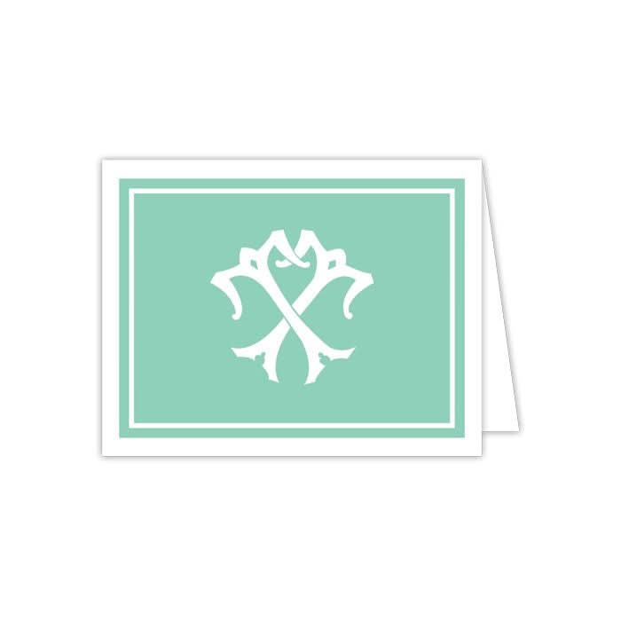 A Gift Bar - Folded Note in mint green, part of a set of 10, showcases an intricate white symmetrical design at its center. The card comes with matching envelopes and features a white border, displayed slightly open against a pristine backdrop.