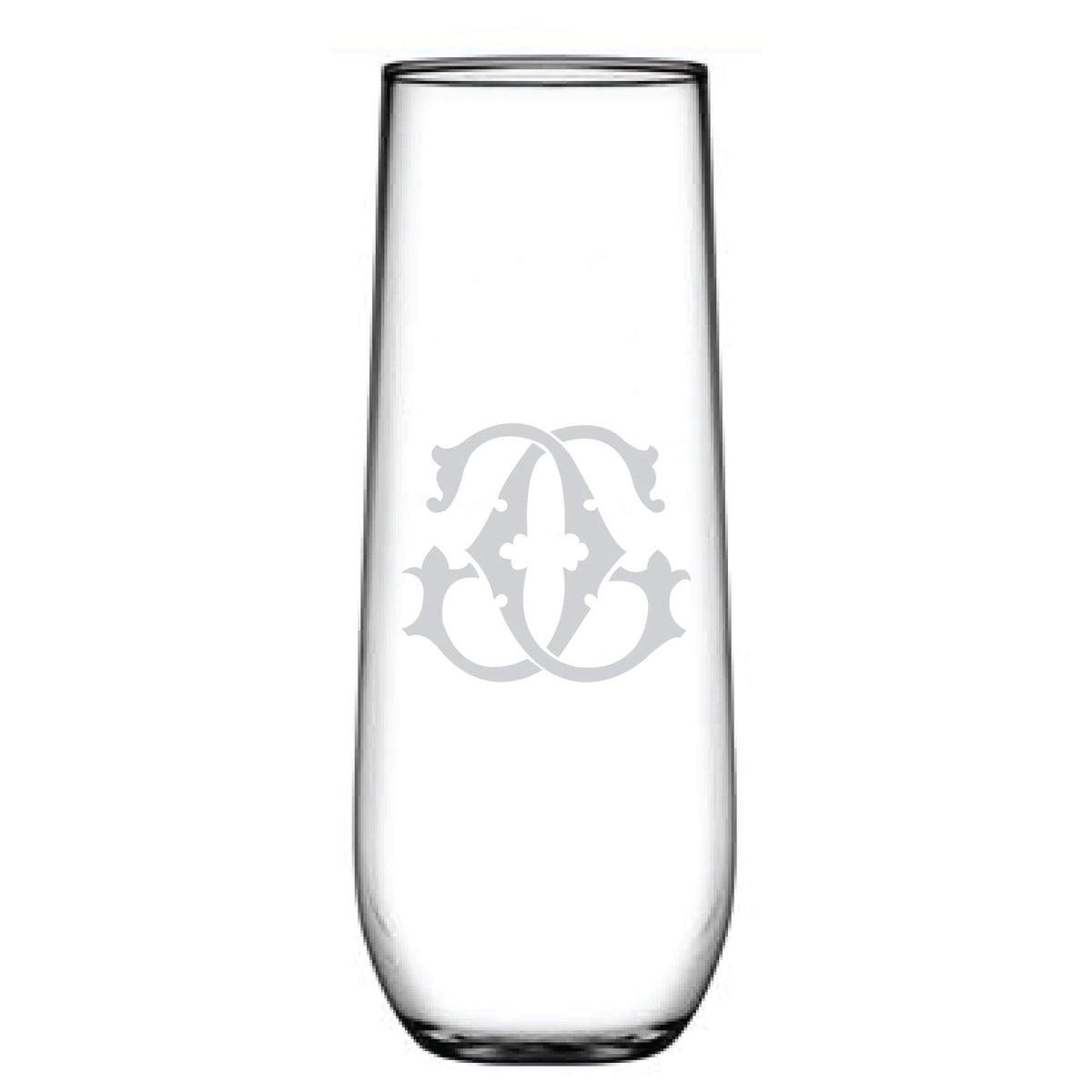 A clear 1-Letter Monogrammed Stemless Champagne Flute with a stylish etched design, showcasing a symmetrical ornate pattern in white and a personalized initial, all set against a plain white background.