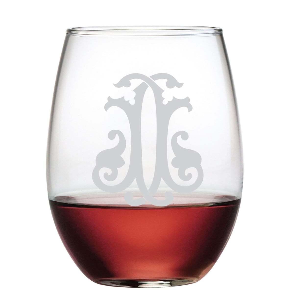 The 1-Letter Etched Initial Stemless Wine Glass, filled halfway with red wine and ornately monogrammed, is a perfect elegant gift. Displayed on a plain white background, it exudes charm and sophistication.