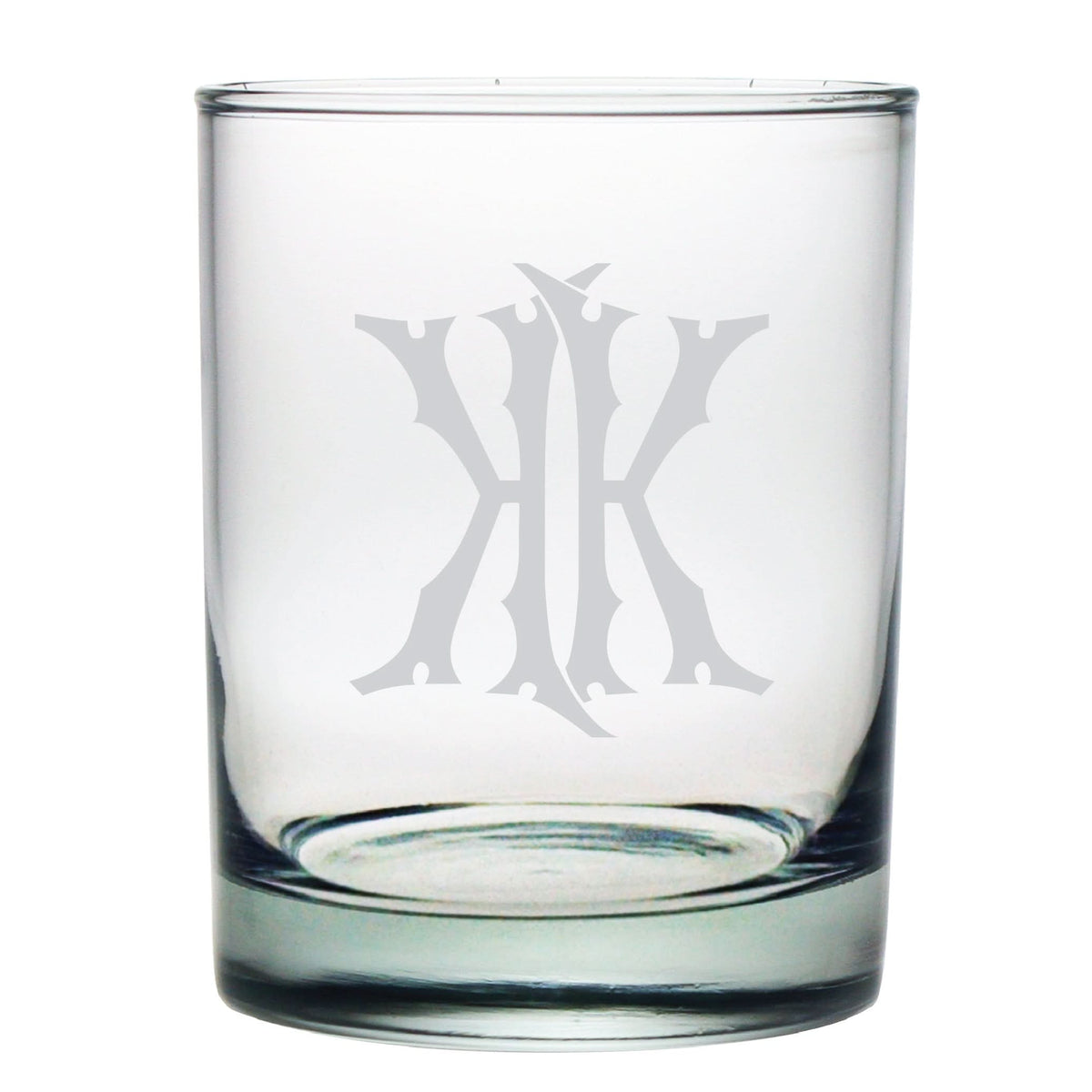 The 1-Letter Monogrammed Lowball Glass is a clear glass with a decorative monogram emblem, making it an elegant gift.