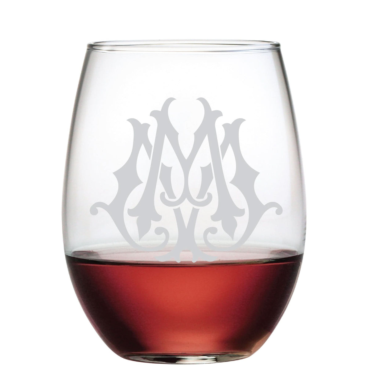The 1-Letter Etched Initial Stemless Wine Glass, half-filled with red wine, elegantly displays an intricately monogrammed letter M, making it an ideal gift for lovers of vintage-inspired charm.