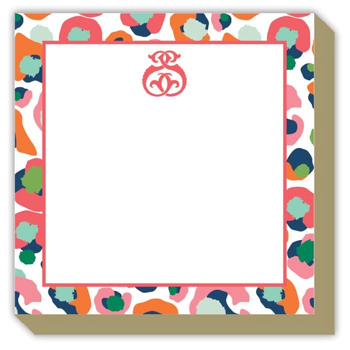 Introducing the Gift Bar - Mini Luxe Notepad: This stylish notepad contains 100 sheets, each featuring a stunning white center with an abstract border in vibrant hues of pink, green, blue, and orange. Measuring 4 x 4 inches, each page is adorned with a sophisticated red decorative emblem at the top. The pages have elegantly rounded edges for a refined finish.
