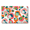 The Multi Spot Cheetah Placemats are a stack of printed cards that serve as disposable placemats, showcasing an abstract design with colorful blobs in shades of pink, orange, green, and teal against a white background.