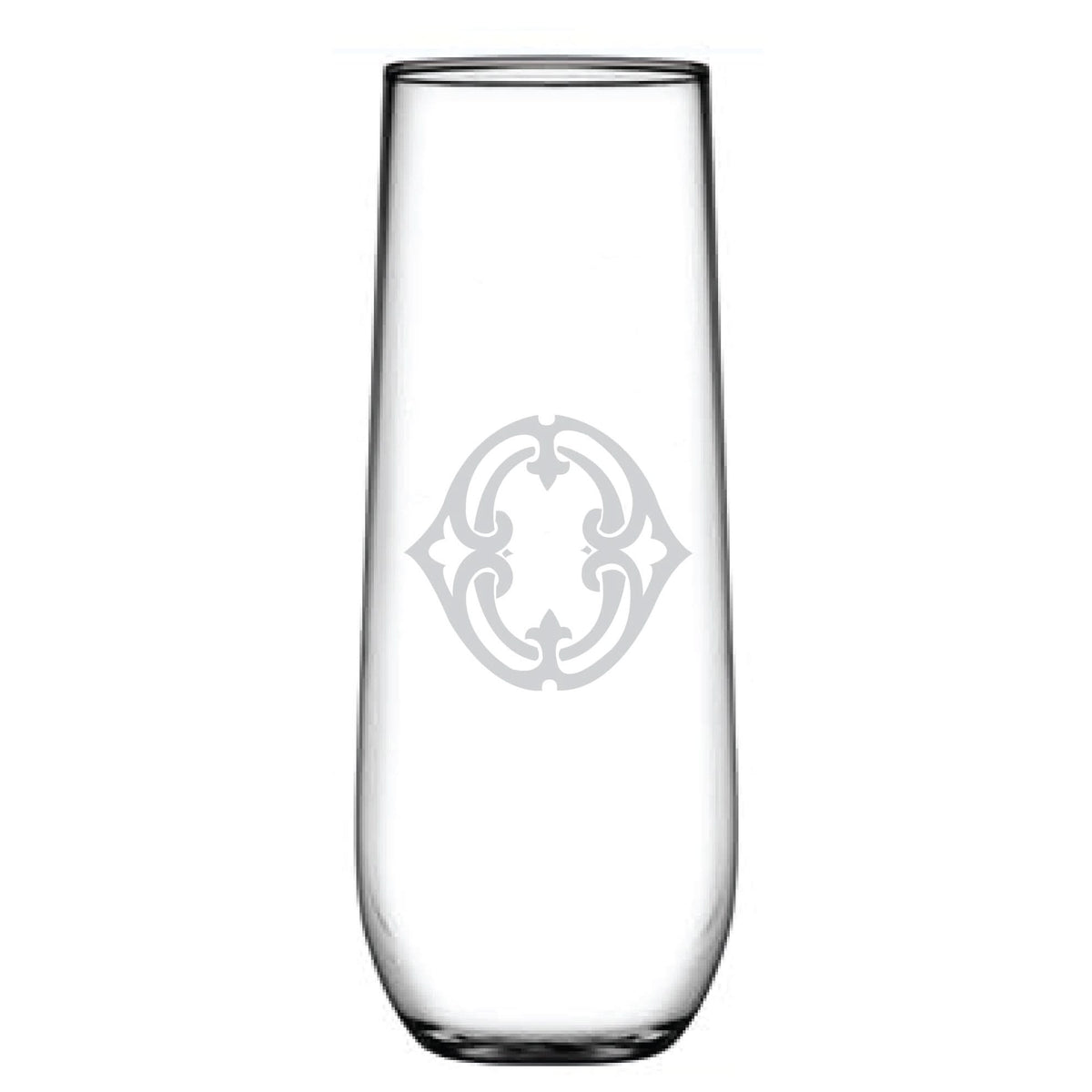 A tall stemless champagne flute with an ornate circular silver design etched in the center. It has a slightly curved body and flat base, featuring symmetrical intricate patterns ideal for personalization with an initial. Product Name: 1-Letter Monogrammed Stemless Champagne Flute.