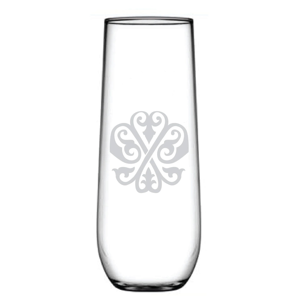 The 1-Letter Monogrammed Stemless Champagne Flute showcases an intricate, floral-like decorative pattern etched in white on its tall, clear glass surface. Its personalized initial adds a bespoke touch as it stands upright against a plain white background.