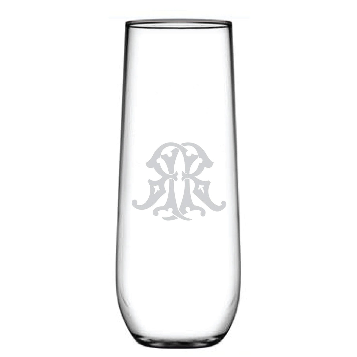 The 1-Letter Monogrammed Stemless Champagne Flute is a tall, clear glass with an etched initial in an intricate monogram design on one side. Its sleek, contemporary shape and slightly rounded base are enhanced by decorative intertwined letters.
