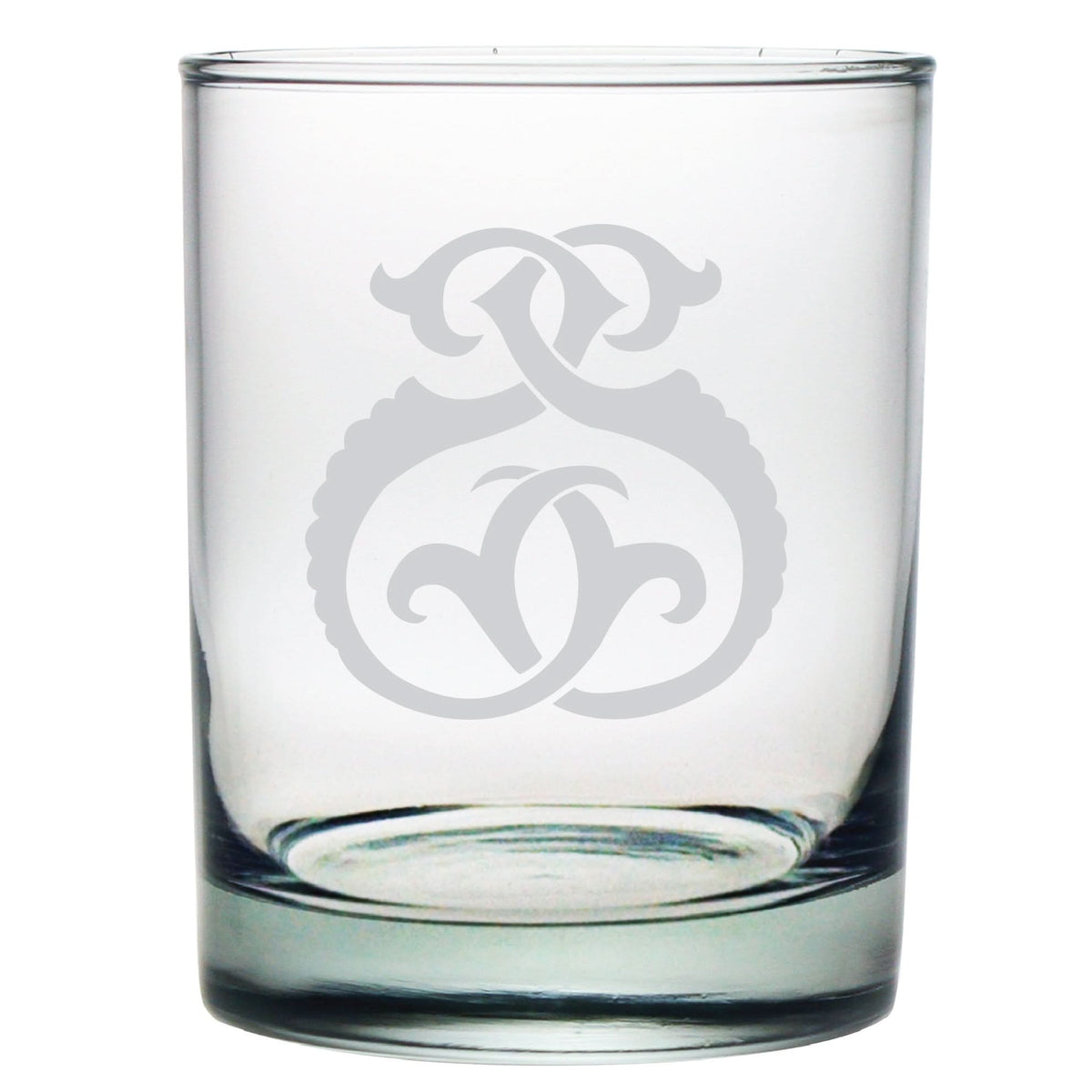The 1-Letter Monogrammed Lowball Glass is a clear lowball glass with an intricate, decorative circular emblem of intertwining gray etched curves, providing a monogram style look that adds a symmetrical, ornate touch at the center—perfect for any occasion.