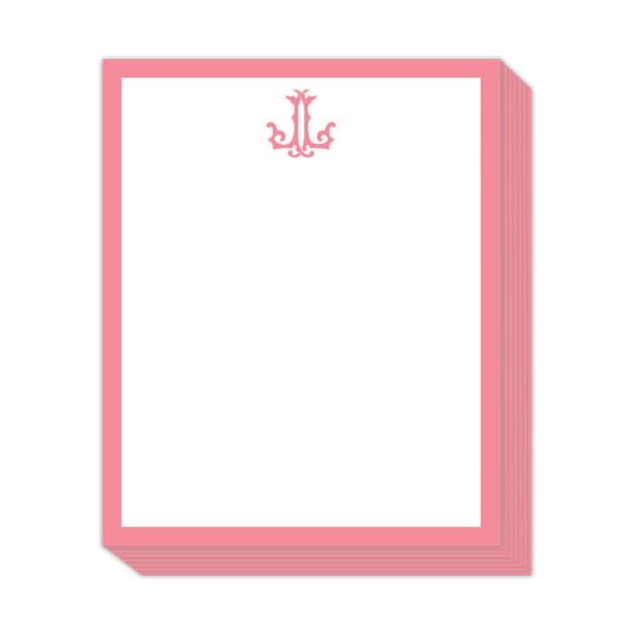 The Gift Bar - Short Stack Pad, consisting of 5.25 x 6.5" text weight sheets adorned with a decorative pink emblem at the top center and soft pink borders, brings an elegant touch to your stationery collection.