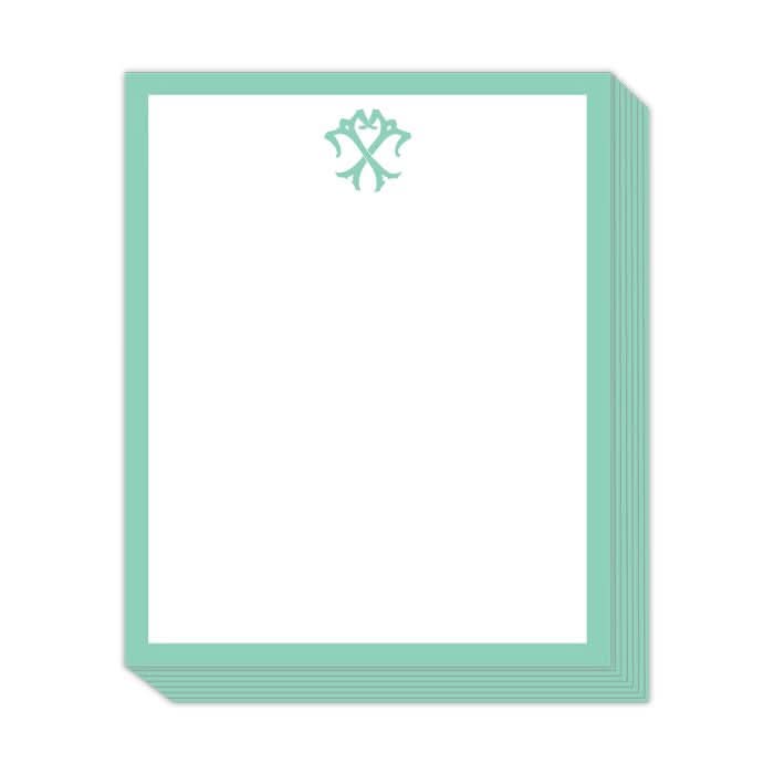 The Gift Bar - Short Stack Pad is a compact collection of blank papers in a 5.25 x 6.5" format, highlighted by a teal border and adorned with an intricate teal emblem at the top center on a clean white background.
